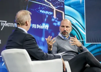 Uber CEO Says Musk Wants to Go Alone on Tesla Robotaxi Rollout